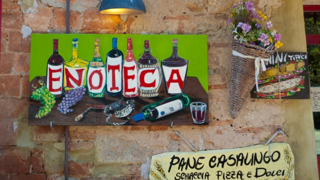 Sign outside an enoteca (wine bar) Bolgheri (Toscana)