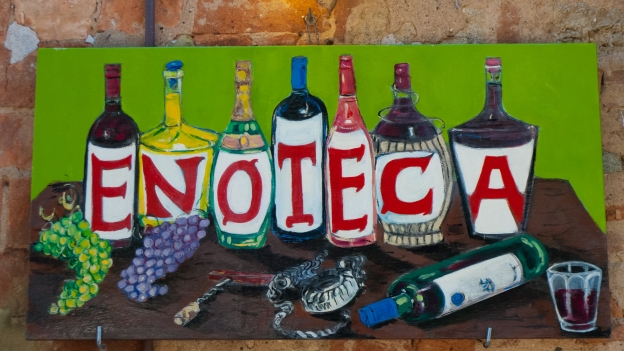 Sign outside an enoteca (wine bar) Bolgheri (Toscana)