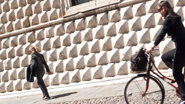 Cyclist in Ferrara (in the background is the Palazzo dei Diamanti)