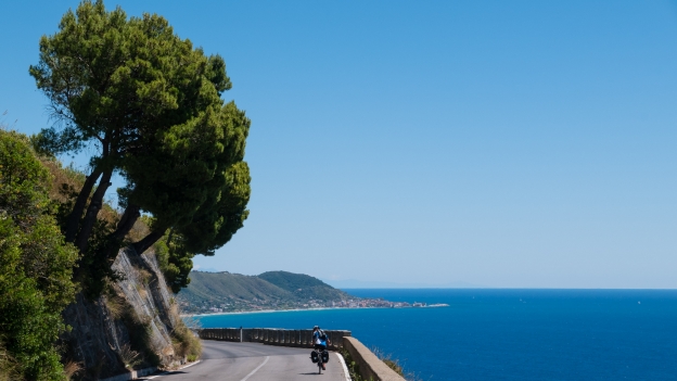 Cyclist on the Costiera Cilentana near San Nicola a Mare (Campania)