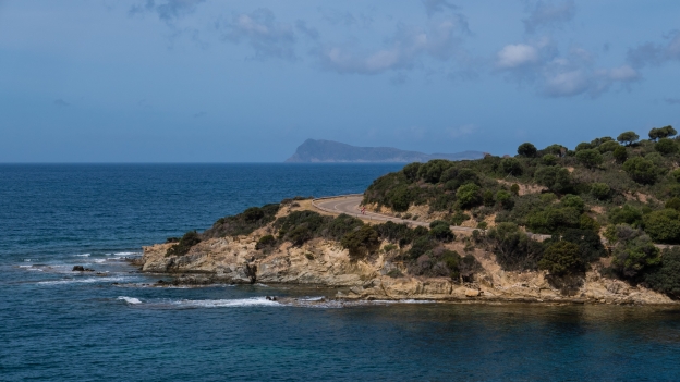 Cyclist on the SP71 coast road