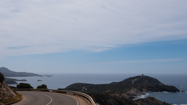 On the SP71 coast road as the Torre di Malfatano comes into view