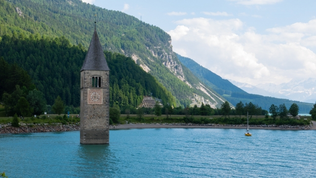 The Reschensee (Lago di Resia) the old church of Graun in Vinschgau (Curon Venosta)