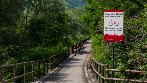 Signs on the Bozen city boundary welcoming cyclists to the city of the bicycle