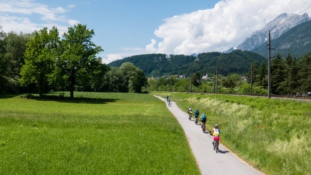 Cyclists on the Innradweg section of the München-Venezia cycle route near Vomp