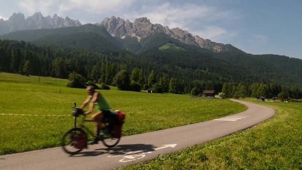 Cyclist on the Fahrradroute Pustertal near Innichen (San Candido)