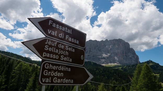 Dolomites road signs Road signs on the road to the Jouf de Sela (Passo di Sella/Sellajoch) from the Ju de Frara (Passo Gardena/Grödnerjoch)